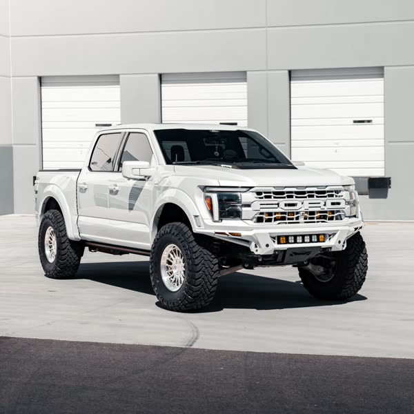 2025 Ford Raptor with bumpers, lighting, and forged wheels